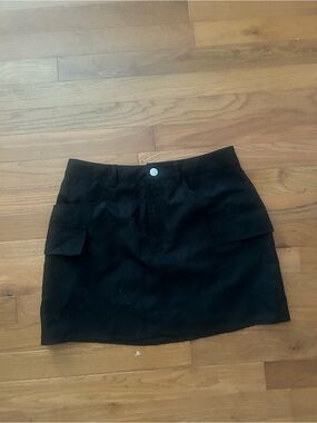 Black Mini Skirt with Front Patch Pockets